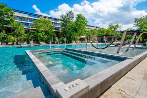 Playacar Casa | Luxury 2 Bedroom Condo - Infinity Pool at AWA Residences in Playacar, AWA 107