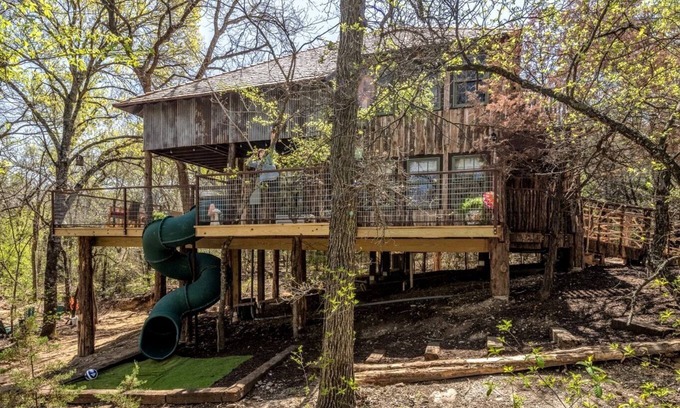 Dennis Casa | Magical Treehouse with Slide by Brazos River for Family Glamping Adventures in Texas