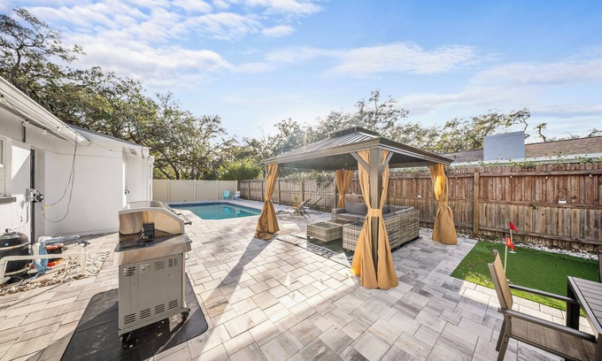 Carrollwood Casa | Fun Oasis! Private Pool, Hammock, Golf, Grill, and Arcade!