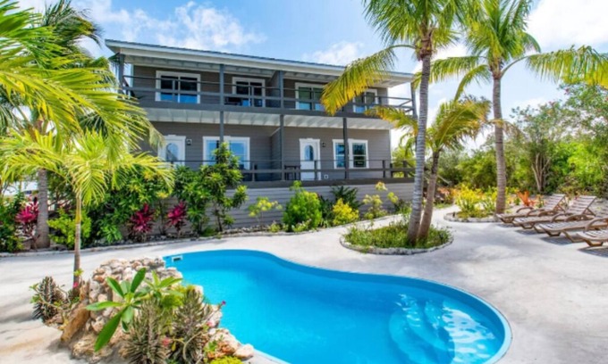 North Palmetto Point Condominio | Migrate Beach Chalets #2, sleeps 7. N Palmetto Point. WiFi. AC. Pools. Paradise!