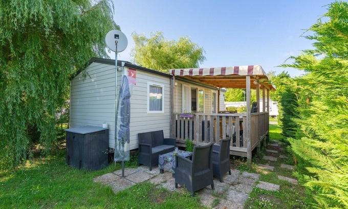 Les Mathes Alquiler De RV | Mobil Home 'La Palmyre 4etoiles' con terraza privada, jardín privado y aire acondicionado