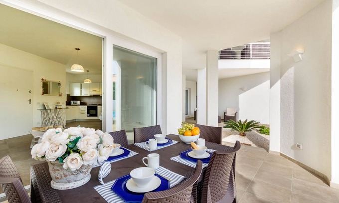 Monte Petrosu Apartamento | apartamento moderno a 5 min. del mar con piscina, aire acondicionado y wi-fi