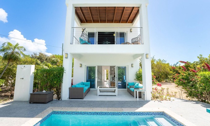 The Bight Villa | Villa de playa 2020 de nueva construcción | 250 pasos a la playa de Grace Bay | Piscina propia
