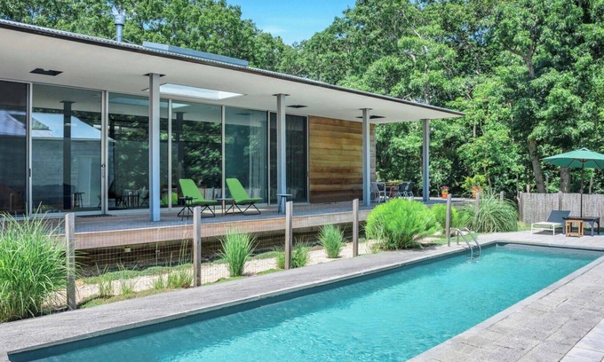 Springs Casa | Modern home sited on a lush wood acre, stunning pool, covered deck, outdoor...