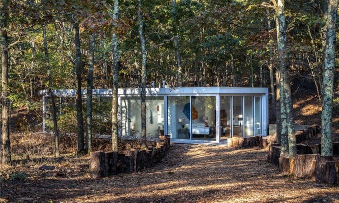 Water Mill Casa | Modernist Glass House nestled in tall pines and nature offering total privacy