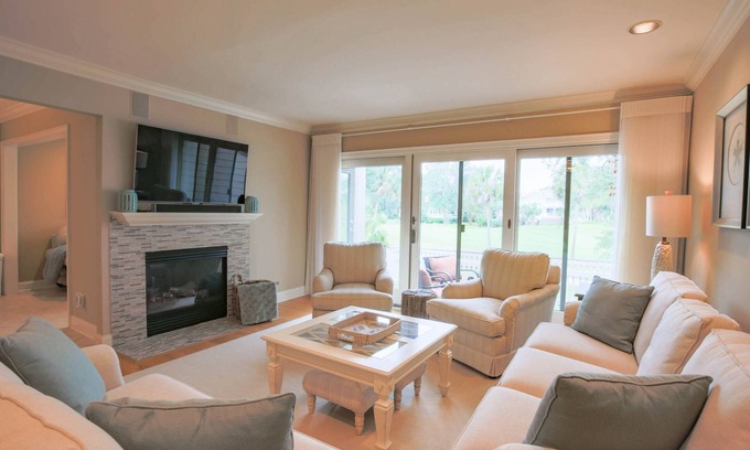 Isle of Palms Casa | Multiple Seating Areas & Outdoor Balconies; Access to Community Pool and Tennis & Pickleball Courts