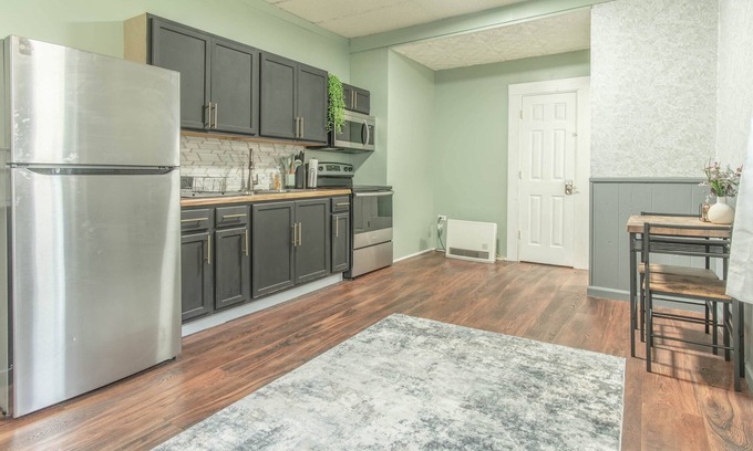 Adams Casa | Cozy Studio style apartment with queen Murphy bed and home theater