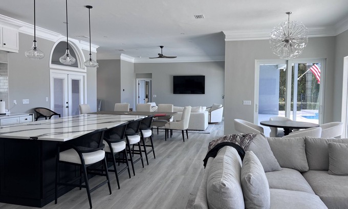 Palm River Estates Casa | Near NCH Baker, NSS Luxury Retreat Near Beach Featuring Pool GameRoom