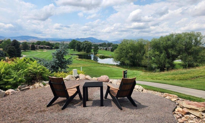 Loveland Casa | Nestled on the Marianna Butte Golf Course in Loveland, this modern garden-level basement retreat offers stunning mountain & lake views through large windows, flooding the space with light. Just a short drive to CSU campus & Estes Park
