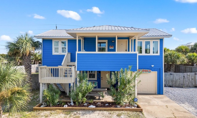 Pensacola Beach Casa | Retro beach house, 4-min walk to sand, bay views, bunk beds, pirate playset.