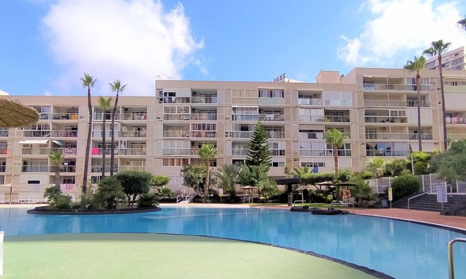 Benidorm Apartamento | Nice apartment for 4 guests with A/C, pool, WIFI, TV, terrace, pets allowed and parking