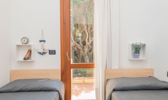 Costa Paradiso Casa | Nice apartment in villa for 4 guests with WIFI, TV, terrace and parking