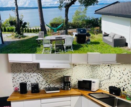 Oslo Apartamento | Nice Apartment with1 bedroom Separate living room with a sofa bed and a tiny kitchen a bathroom located in Nordstrand near by the Sea for 3 guests with a garden and grill with sea view just outside the apartment
