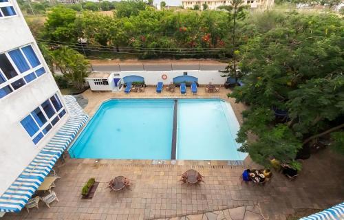 Mombasa Apartamento | Ocean Blue Retreat-3 minute walk to Nyali Center and 3 minute walk to the Beach