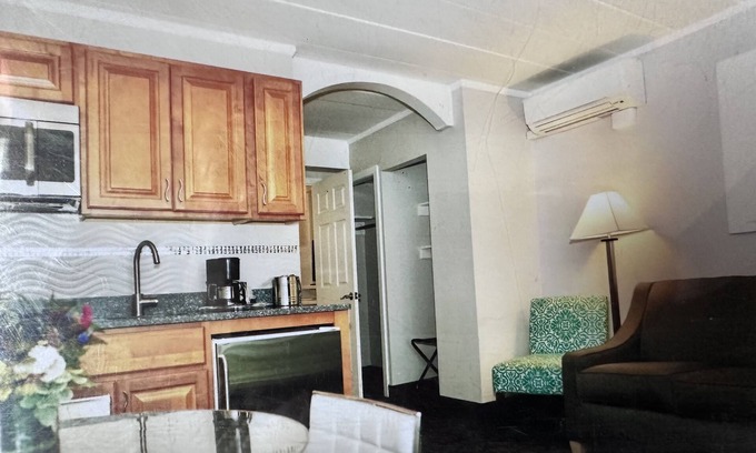 Cape May Apartamento | Oceanfront Property Suite Kitchenette with a Private Bedroom and a Queen Bed