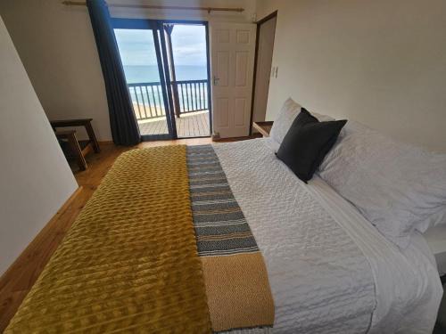 Ifafa Beach Casa | Oceanview Wooden Cottage