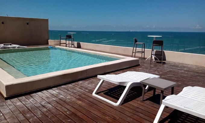 Chicxulub Puerto Apartamento | OLEA Beach Condos en Chicxulub Puerto