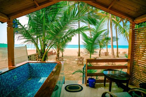 Agonda Complejo | orange sky beach bungalow