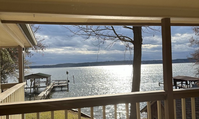 Farmerville Casa | Peaceful lake front home with wrap around porch and relaxing views!
