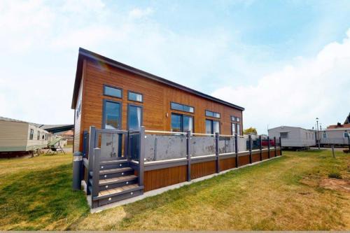 Towyn Casa | Pebble Beach Resort The Goodwood Lodge