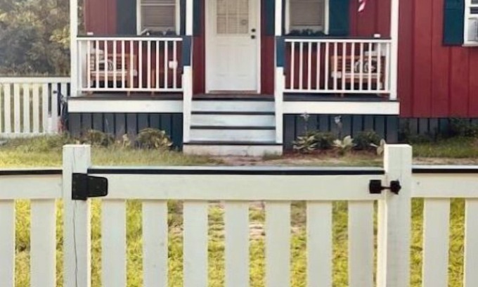 Orangeburg County Cabaña | Pet friendly country cottage with large fenced-in yard & horses on property