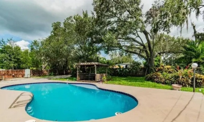 Temple Terrace Villa | Pool villa near Bush Gardens & Hard Rock Casino!