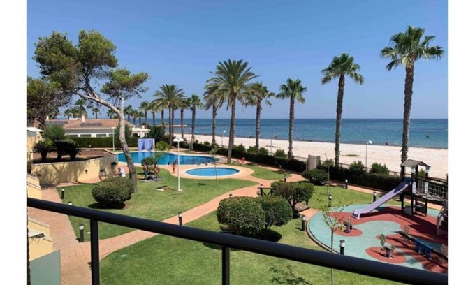 Playa de la Almadrava Casa | Precioso apartamento 1° línea de playa. Azul Marino