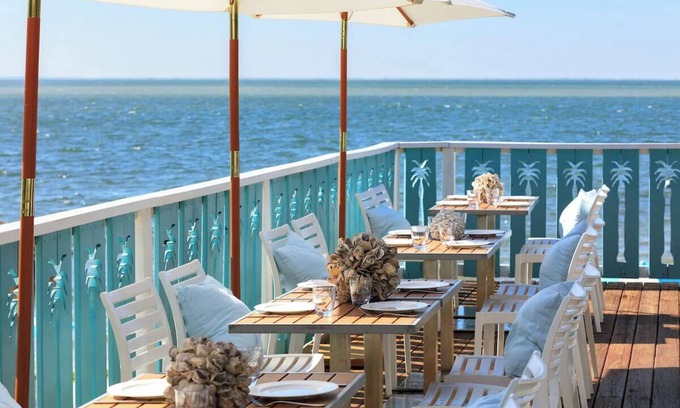 Pinellas Point Hotel | Premier Coastal Unit w/Balcony, Resort Amenities - Dining, Marina Beach Nearby