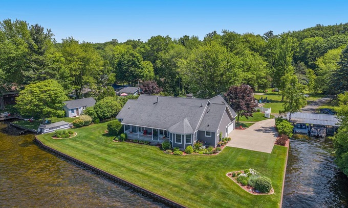 Ludington Casa | Private Hamlin Lake Water Front Cottage Perfect Family Retreat