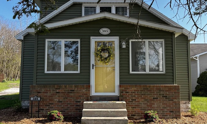 Manistee Casa | Private Hot Tub, Outdoor TV, near Downtown & Lake Michigan Beaches!