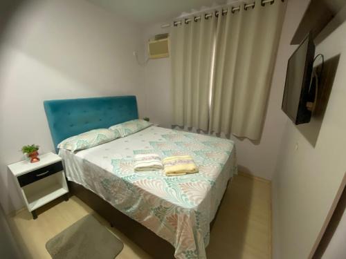 Zona Industrial Norte Apartamento | Quarto aconchegante com banheiro