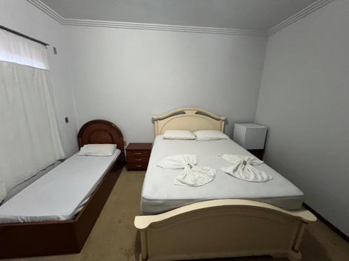Sinop Casa | Quarto no centro com 2 camas e hidromassagem