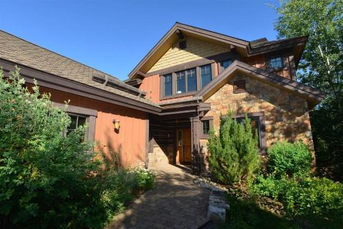McCall Casa | Red Tail on the River by Casago McCall - Donerightmanagement