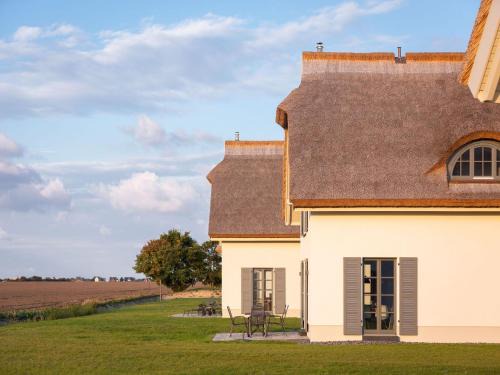 Kreptitz Casa | Reetland am Meer - Premium Reetdachvilla mit 3 Schlafzimmern, Sauna und Kamin E10