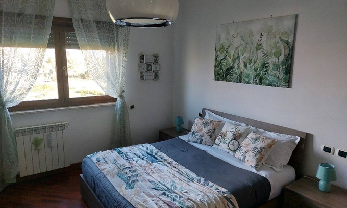 Centro Giano Apartamento | Regina Cyclarum Suite. Vacation home near Rome Fair and FCO airport!