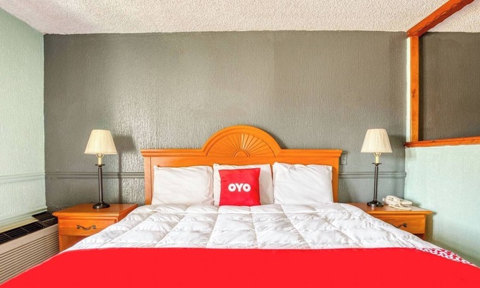 South Tulsa Hotel | Relax and Recharge in a Quiet Room w/ King Bed + Handy Mini Fridge Setup