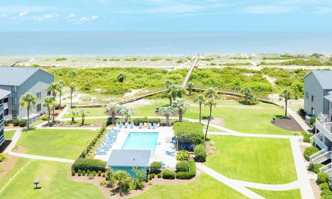 Oceanmarsh Subdivision Condominio | Relax in Coastal Comfort – 2BR/2.5BA Harbor Island Retreat