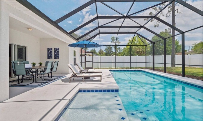 Palm Coast Casa | Renovated Heated Pool home with Game room and Bicycles