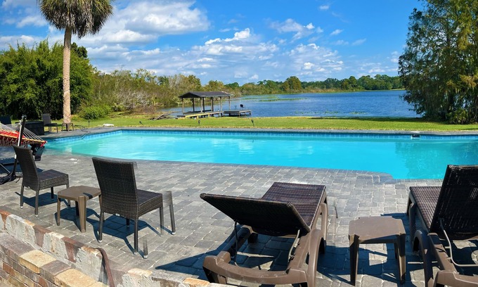 Casselberry Casa | Resort like Lake House on 2+ acres, Golf Course, pool, fishing dock, pool table