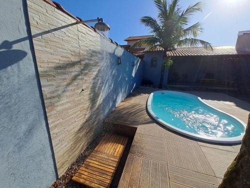 Itaipuacu Apartamento | RiqueHouse: Piscina, churrasqueira a 500m da praia