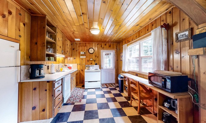 Wallowa County Casa | Riverfront cabin with large yard, great deck, fireplace, washer/dryer, & WiFi