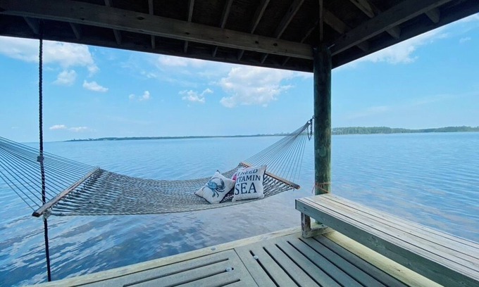 Hobucken Casa | Riverfront property with dock and ramp. Dolphins, fish, boat, swim & more