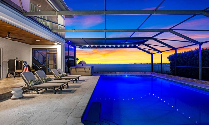 Caloosahatchee Casa | Riverfront Riviera Outdoor TV's/Hotub/Tanning Deck