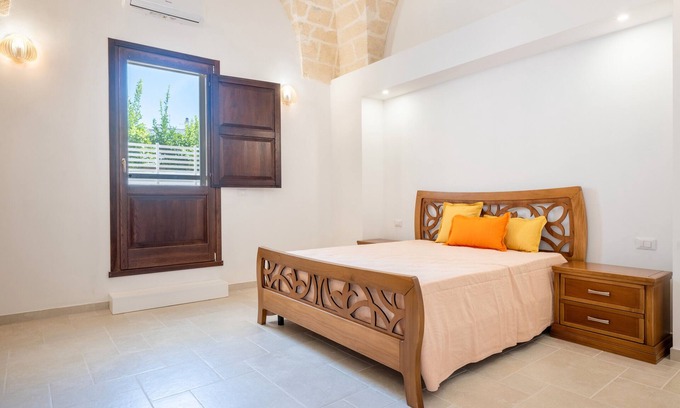 Pulsano Apartamento | Habitación 'Piano Terra' con Jardín Privado, Wi-Fi y Aire Acondicionado