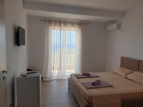 Dhermi Apartamento | Rooms by George