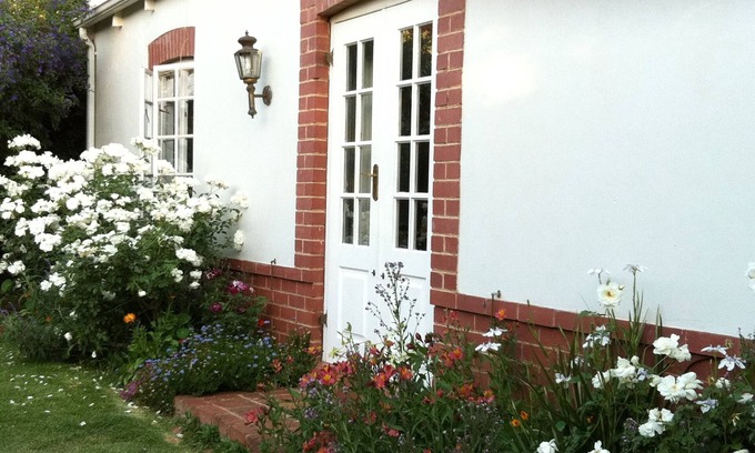 Parkview Cabaña | Rose Cottage en un hermoso jardín