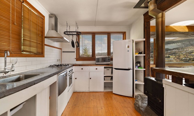 Kelvin Heights Apartamento | Rustic Charm Nest
