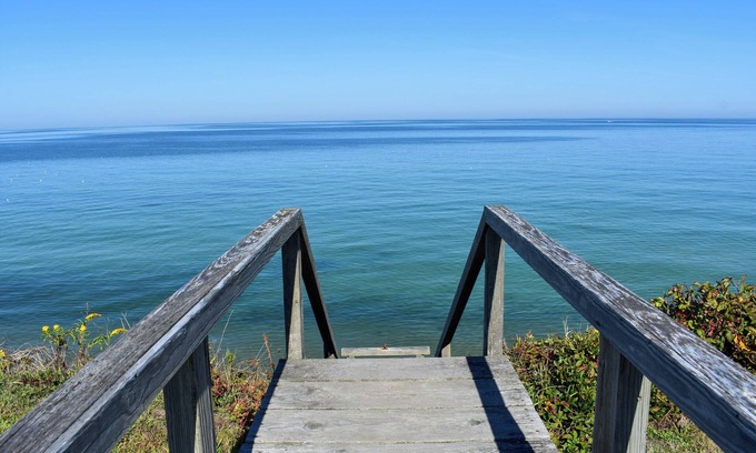 Dennis Casa | Rustic Oceanfront Retreat with Private Beach and Expansive Deck