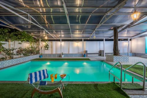 Kavathe Mahankal Villa | SaffronStays The Blue Door