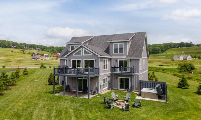 Waterfront Greens Casa | Peaceful Retreat: Lakefront, Dogs Welcome, Hot Tub, Fireplace!